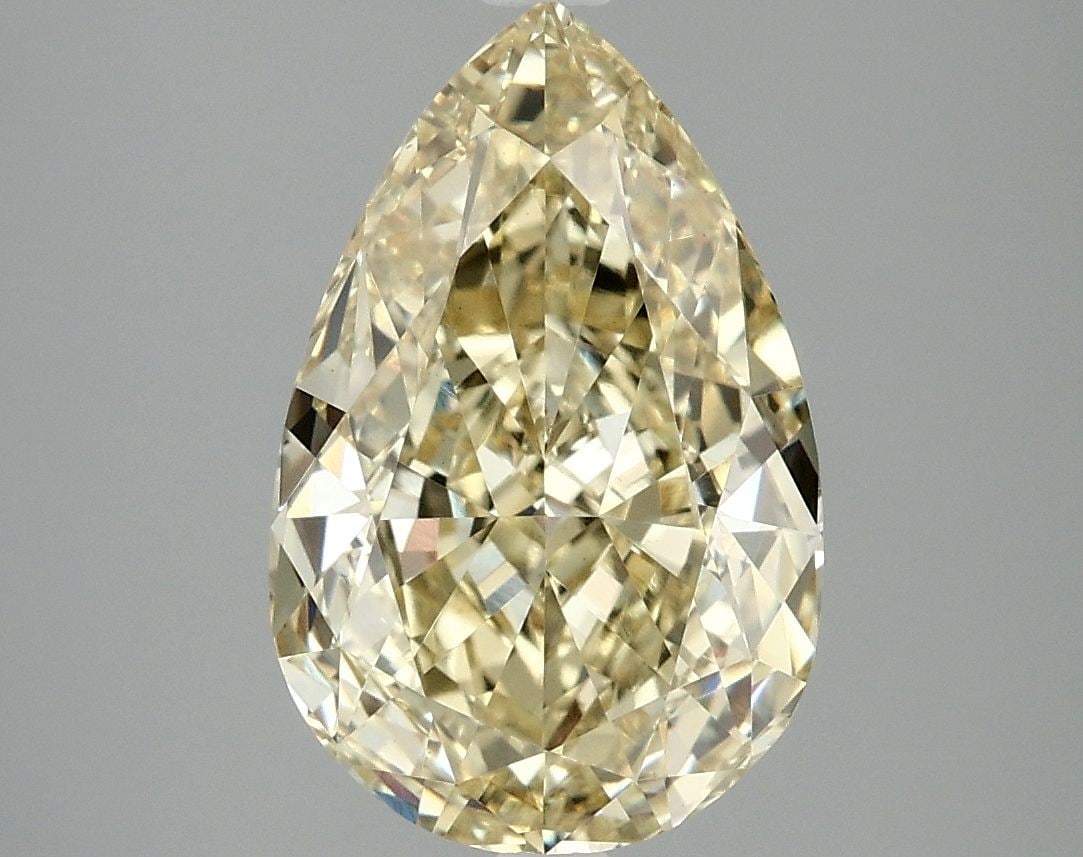 Loose Diamond - PEAR 4.08ct Fancy Vivid Yellow VVS2: Loose Diamond - PEAR 4.08ct Fancy Vivid Yellow VVS2 Source: This is a real non-mined Diamond that has been grown in a lab Shape: PEAR Carats: 4.08 Color: Fancy Vivid Yellow Certification: IGI Video: