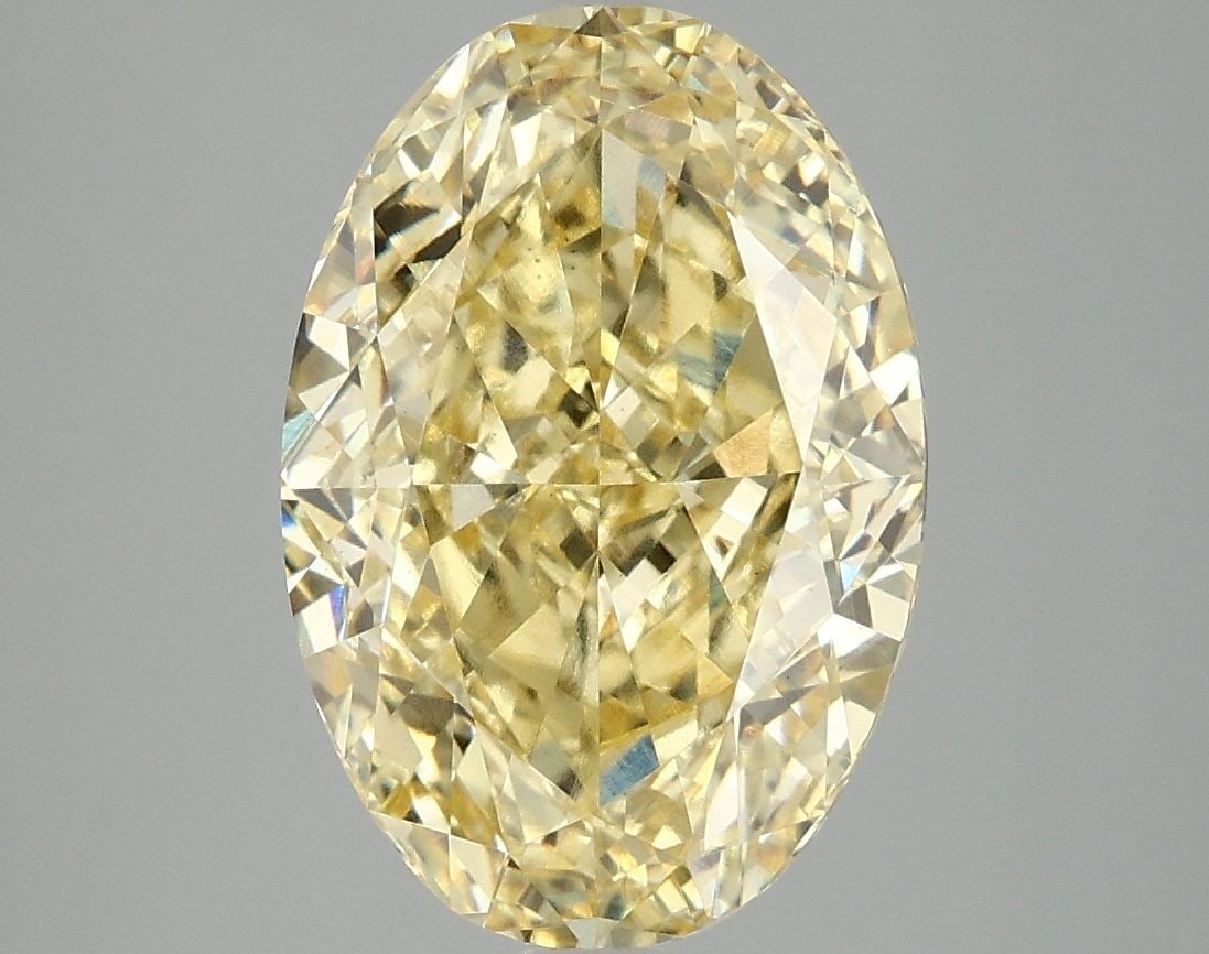 Loose Diamond - OVAL 5.08ct Fancy Vivid Yellow VS1: Loose Diamond - OVAL 5.08ct Fancy Vivid Yellow VS1 Source: This is a real non-mined Diamond that has been grown in a lab Shape: OVAL Carats: 5.08 Color: Fancy Vivid Yellow Certification: IGI Video:
