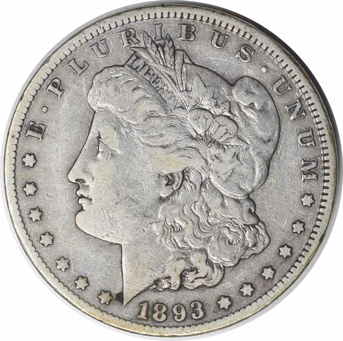 1893-CC Morgan Silver Dollar VF Uncertified 90% Silver Coin: 1893-CC Morgan Silver Dollar VF Uncertified 90% Silver Coin This 1893-CC Morgan Silver Dollar is a remarkable piece for collectors and enthusiasts alike. Struck in Carson City, this coin features a cl