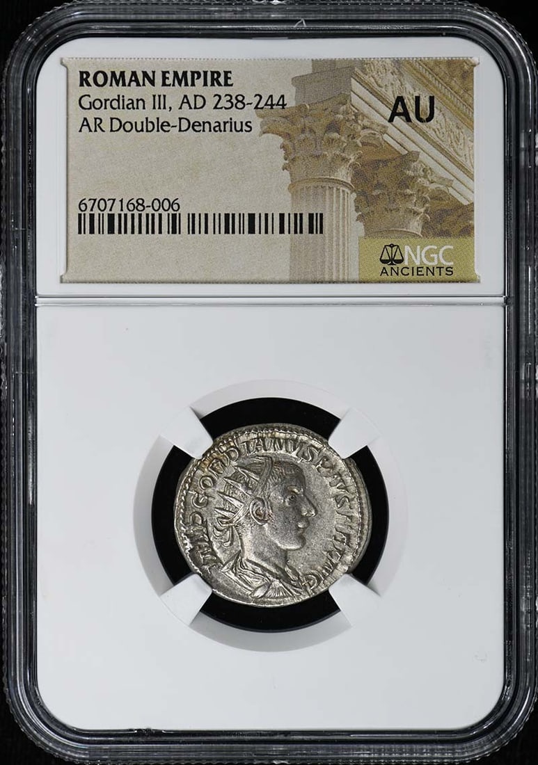 NGC AU50 Double Denarius Ancient Roman Coin Gordian III: NGC AU50 Double Denarius Ancient Roman Coin Gordian III This Roman Empire AR Double-Denarius dates from the reign of Gordian III, AD 238-244. The coin is certified by NGC with a grade of AU50, indicat