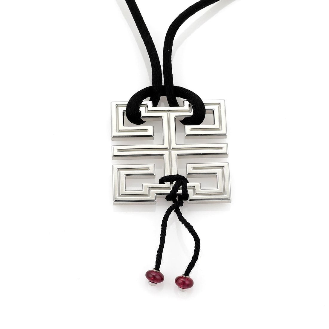 Cartier Le Baiser du Dragon 18K White Gold Garnet Pendant Necklace with Silk Cord: Cartier Le Baiser du Dragon 18K White Gold Garnet Pendant Necklace with Silk Cord Experience the elegance of the Cartier Le Baiser du Dragon pendant necklace. This exquisite piece features a beautiful