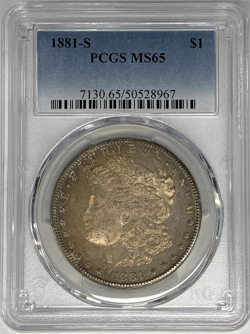 PCGS MS 65 1881-S Morgan Silver Dollar with Toning: PCGS MS 65 1881-S Morgan Silver Dollar with Toning This is an 1881-S Morgan Silver Dollar featuring a natural toned appearance. Certified by PCGS with a grade of MS 65, this uncirculated coin originat