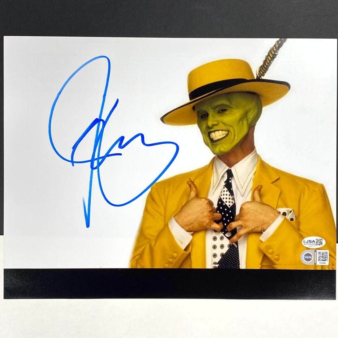 11x14 The Mask Photograph Autographed by Jim Carrey JSA and SWAU Authenticated: 11x14 The Mask Photograph Autographed by Jim Carrey JSA and SWAU Authenticated This original 11x14 photograph from the movie The Mask is hand-signed by Jim Carrey. The autograph is authenticated by Ja