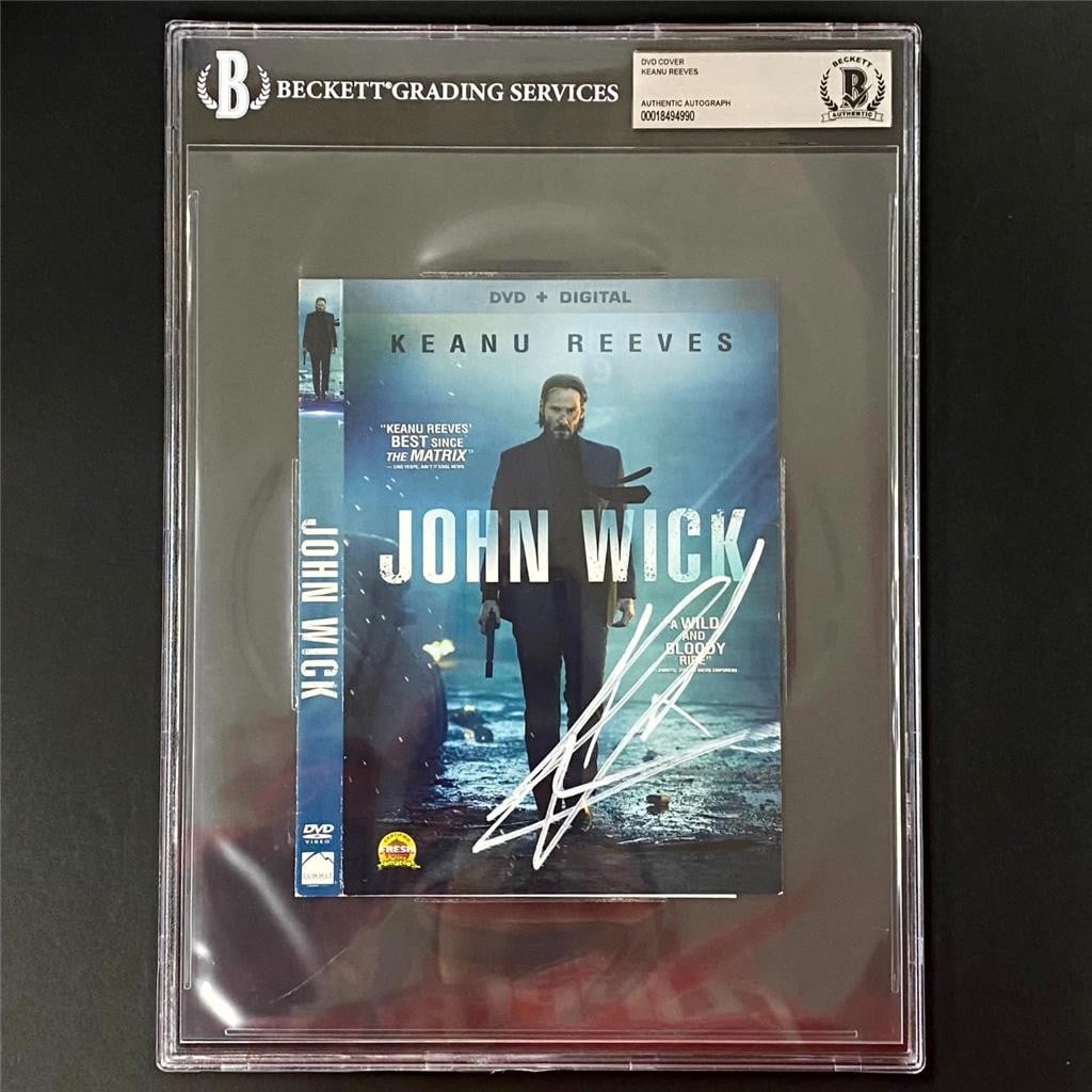 John Wick DVD Cover Autographed by Keanu Reeves Beckett Authenticated: John Wick DVD Cover Autographed by Keanu Reeves Beckett Authenticated This is an original DVD cover from the movie John Wick, signed by Keanu Reeves. The autograph has been authenticated by Beckett. T