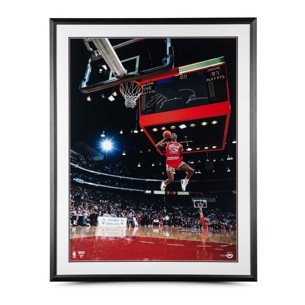 Michael Jordan Signed 30x40 Framed Photo Upper Deck Bulls Dunk: Michael Jordan Signed 30x40 Framed Photo Upper Deck Bulls Dunk This stunning 30X40 framed photo captures Michael Jordan performing a legendary dunk during the 1988 season with the Chicago Bulls. The i