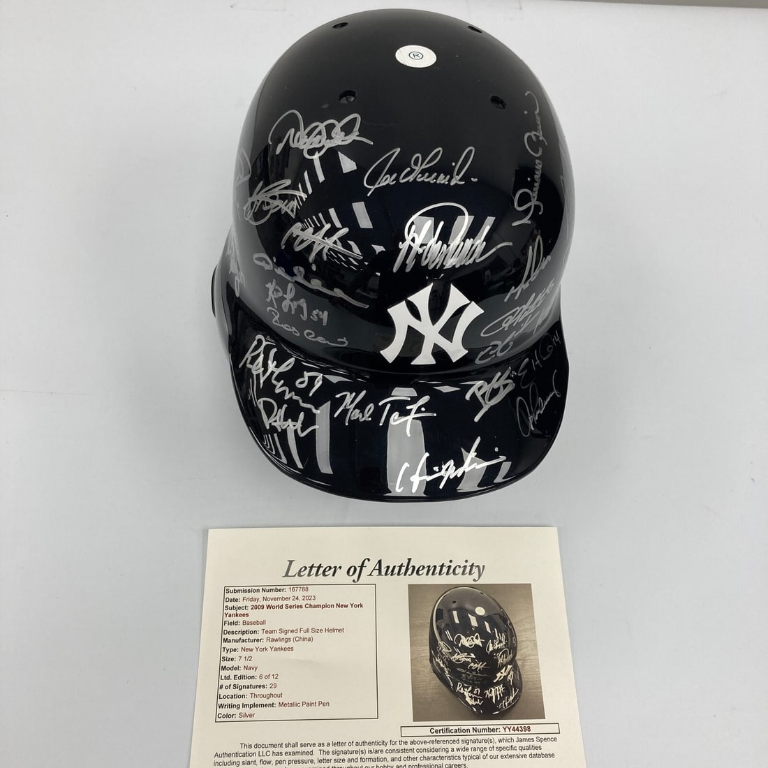 2009 Yankees World Series Champs Team Signed Helmet 6/12 JSA COA: 2009 Yankees World Series Champs Team Signed Helmet 6/12 JSA COA Celebrate the legacy of the 2009 New York Yankees with this limited edition team-signed Game Model Helmet, commemorating their World Se