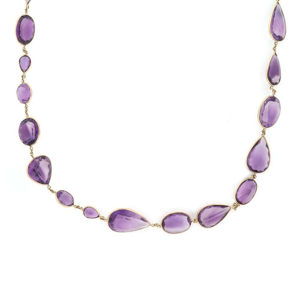 Elegant 371 Carat Amethyst & 18k Yellow Gold Necklace 37" Long: Elegant 371 Carat Amethyst & 18k Yellow Gold Necklace 37" Long This stunning estate necklace features a luxurious design crafted from 18k yellow gold. Adorned with an assortment of bezel-set amethyst