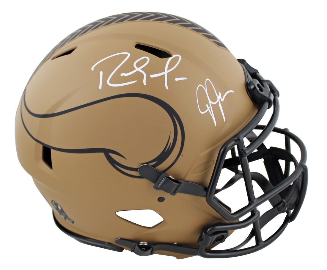 Justin Jefferson Randy Moss Signed Vikings Helmet BAS Witnessed Authentic: Justin Jefferson Randy Moss Signed Vikings Helmet BAS Witnessed Authentic This authentic full-size Speed Proline helmet is a standout collectible featuring the signatures of NFL stars Justin Jefferson
