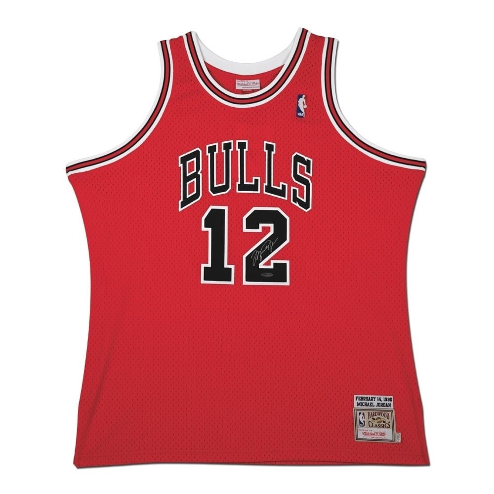 Michael Jordan Autographed 1990 Red Bulls Jersey #12 Upper Deck Authenticated: Michael Jordan Autographed 1990 Red Bulls Jersey #12 Upper Deck Authenticated Celebrate the legacy of Michael Jordan with this autographed 1990 Red Mitchell & Ness #12 jersey, representing the Chicago