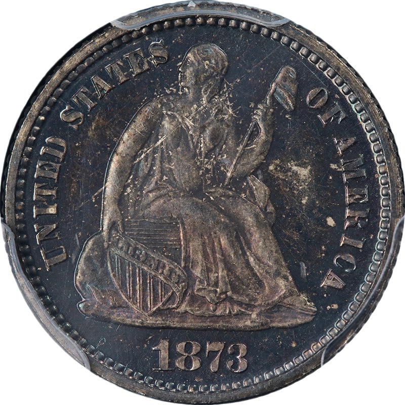 PCGS PR64 1873 Seated Liberty Half Dime Silver With Colorful Toning: PCGS PR64 1873 Seated Liberty Half Dime Silver With Colorful Toning This 1873 Seated Liberty Half Dime is certified by PCGS with a PR64 grade. The coin is uncirculated, featuring attractive toning, no