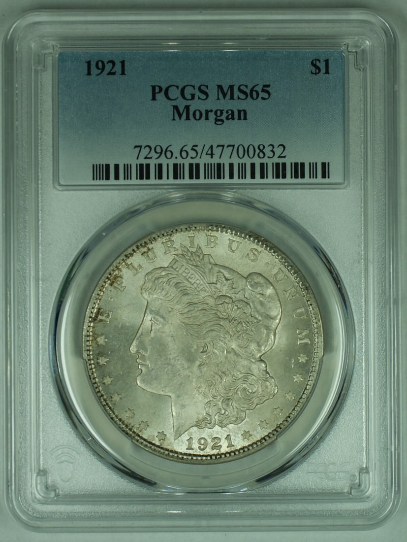 PCGS MS 65 1921 Morgan Silver Dollar Uncirculated $1 Coin: PCGS MS 65 1921 Morgan Silver Dollar Uncirculated $1 Coin This is a 1921 Morgan Silver $1 Dollar Coin from the United States, featuring the iconic Morgan design. The coin is uncirculated and graded MS