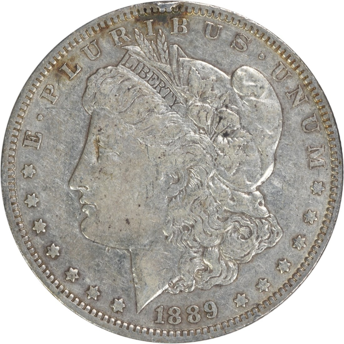 1889-O Morgan Silver Dollar EF Uncertified 90% Silver New Orleans: 1889-O Morgan Silver Dollar EF Uncertified 90% Silver New Orleans This 1889-O Morgan Silver Dollar is a remarkable piece of numismatic history. Struck at the New Orleans Mint, this coin features a str