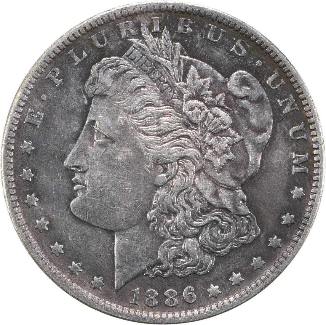 New Orleans Mint 1886 Morgan Dollar 90 Percent Silver Extra Fine Uncertified: New Orleans Mint 1886 Morgan Dollar 90 Percent Silver Extra Fine Uncertified This is an 1886-O Morgan Silver Dollar from the New Orleans Mint, featuring the design by George T. Morgan. Composed of 90%