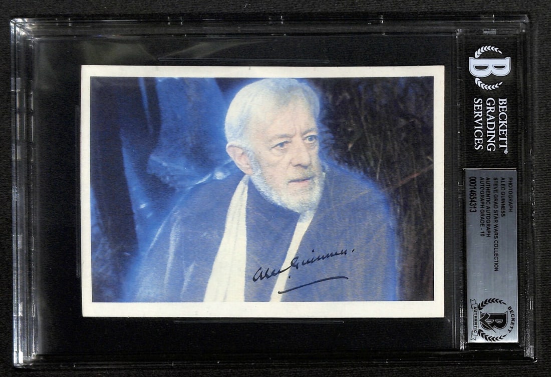 Rare Alec Guinness Signed Obi-Wan Photo ROTJ 6x4.5 Beckett 10: Rare Alec Guinness Signed Obi-Wan Photo ROTJ 6x4.5 Beckett 10 This is a rare 6" x 4.5" color photograph from Return of the Jedi, signed by the legendary Alec Guinness as Obi-Wan Kenobi. The photograph