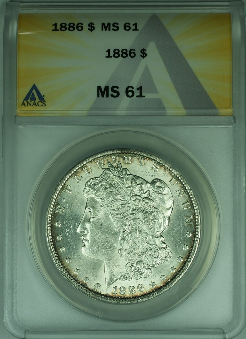 1886 Silver Morgan Dollar Philadelphia ANACS MS61 Certified Coin: 1886 Silver Morgan Dollar Philadelphia ANACS MS61 Certified Coin This 1886 Morgan Silver Dollar is certified by ANACS with a grade of MS 61. Minted in Philadelphia, it is composed of 90% silver and re