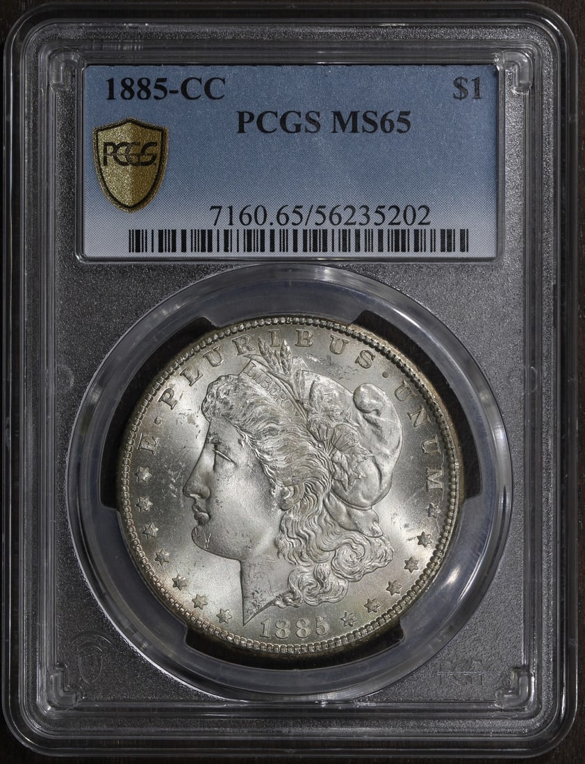 PCGS MS65 Carson City 1885 Morgan Silver Dollar Uncirculated $1 Coin: PCGS MS65 Carson City 1885 Morgan Silver Dollar Uncirculated $1 Coin This 1885-CC Morgan Silver Dollar is graded MS65 by PCGS, indicating an uncirculated condition with excellent eye appeal. Minted in