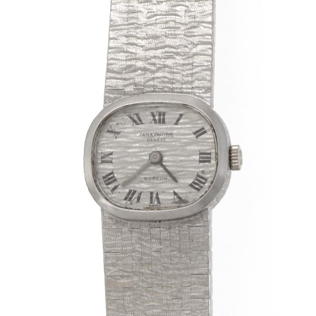 Vintage Patek Philippe 18k White Gold Hand-Wind Ladies Watch: Vintage Patek Philippe 18k White Gold Hand-Wind Ladies Watch Presenting a stunning vintage hand-wind ladies wristwatch by Patek Philippe, expertly crafted in 18k white gold. This elegant timepiece fea