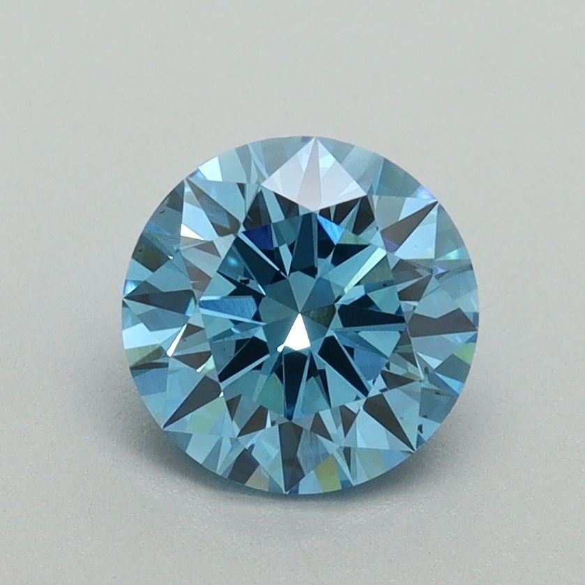 Ideal Loose Diamond - ROUND 1.2ct Fancy Vivid Blue VS2: Ideal Loose Diamond - ROUND 1.2ct Fancy Vivid Blue VS2 Source: This is a real non-mined Diamond that has been grown in a lab Shape: ROUND Carats: 1.2 Color: Fancy Vivid Blue Certification: IGI Video: