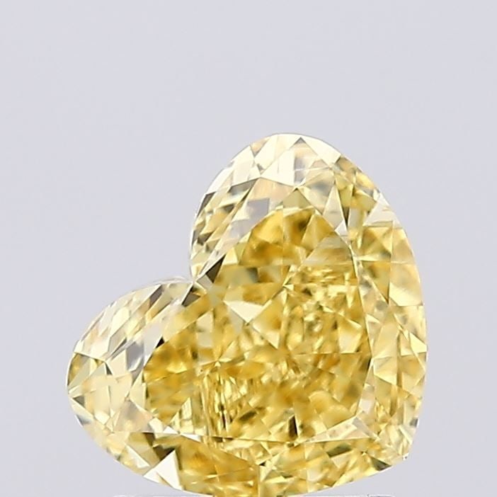 Loose Diamond - HEART 1.37ct Fancy Vivid Yellow VVS2: Loose Diamond - HEART 1.37ct Fancy Vivid Yellow VVS2 Source: This is a real non-mined Diamond that has been grown in a lab Shape: HEART Carats: 1.37 Color: Fancy Vivid Yellow Certification: IGI Video: