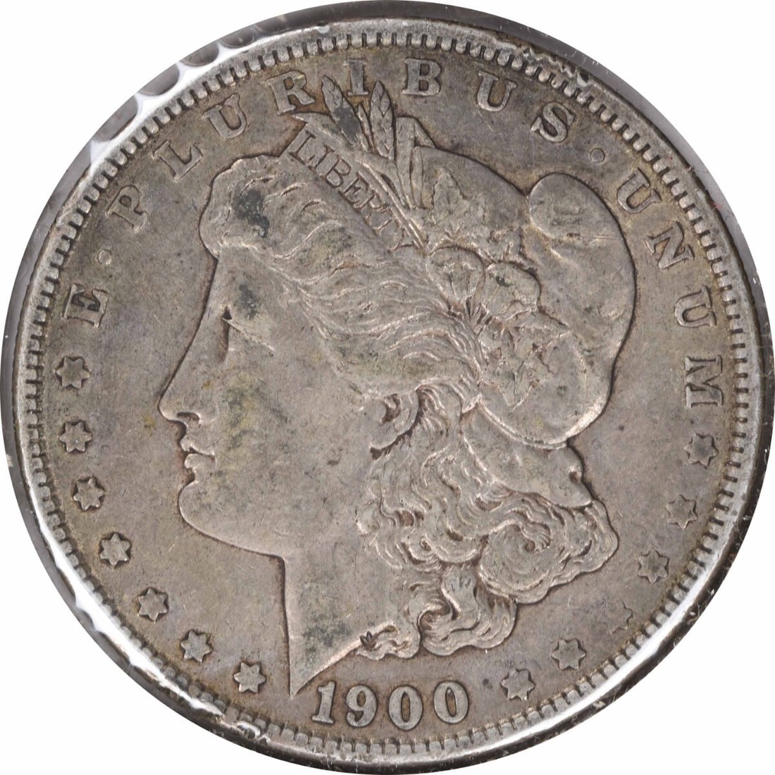 VF 1900-O Over CC Morgan Dollar Silver Coin Uncertified United States: VF 1900-O Over CC Morgan Dollar Silver Coin Uncertified United States This is a circulated 1900-O/CC Morgan Silver Dollar from the United States. Struck at the New Orleans Mint, this coin features a c