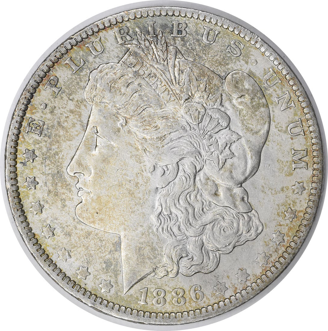 1886-O Morgan Silver Dollar XF Uncertified 90% Silver Coin: 1886-O Morgan Silver Dollar XF Uncertified 90% Silver Coin This 1886-O Morgan Silver Dollar is a beautiful example of classic American coinage, featuring a striking design by George T. Morgan. The coi
