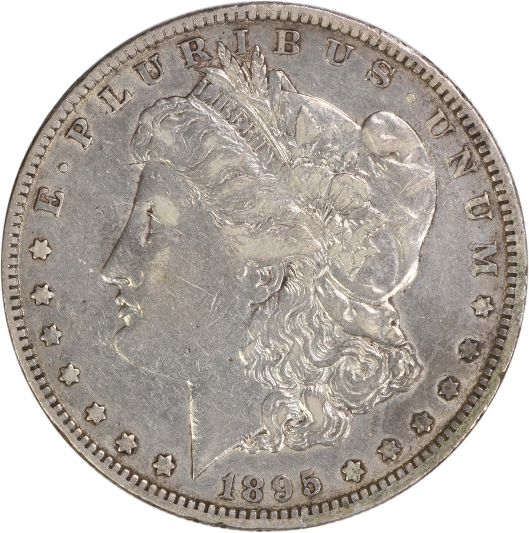EF 1895-O Morgan Dollar Uncertified New Orleans Mint Silver Coin: EF 1895-O Morgan Dollar Uncertified New Orleans Mint Silver Coin This is an 1895-O Morgan Silver Dollar from the United States, featuring the design by George T. Morgan. Struck at the New Orleans Mint