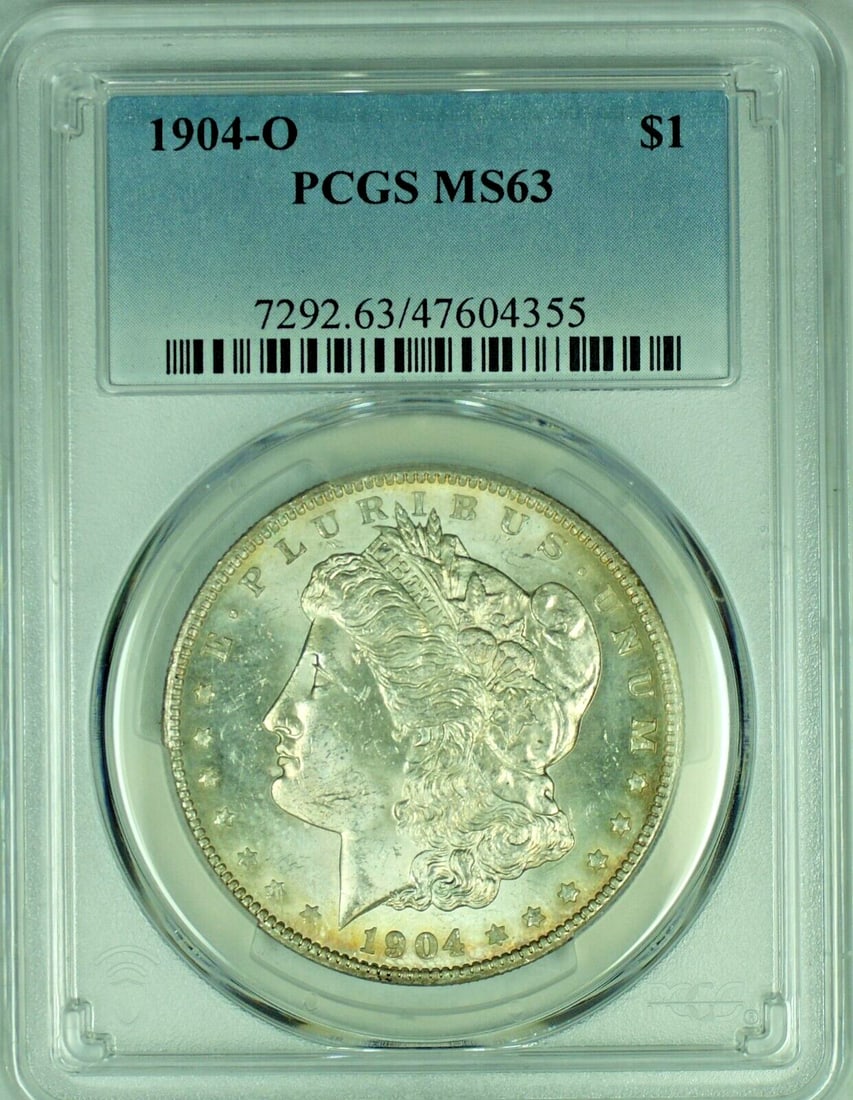 PCGS MS 63 1904-O Morgan Silver Dollar Uncirculated Toned Reverse: PCGS MS 63 1904-O Morgan Silver Dollar Uncirculated Toned Reverse This is a 1904-O Morgan Silver Dollar featuring a toned reverse. Graded MS 63 by PCGS, this uncirculated coin is composed of silver an