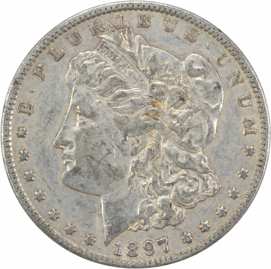 1897-O Morgan Silver Dollar 90% Silver Uncertified Coin: 1897-O Morgan Silver Dollar 90% Silver Uncertified Coin This 1897-O Morgan Silver Dollar is a classic piece of American numismatic history, showcasing the artistry of designer George T. Morgan. The co