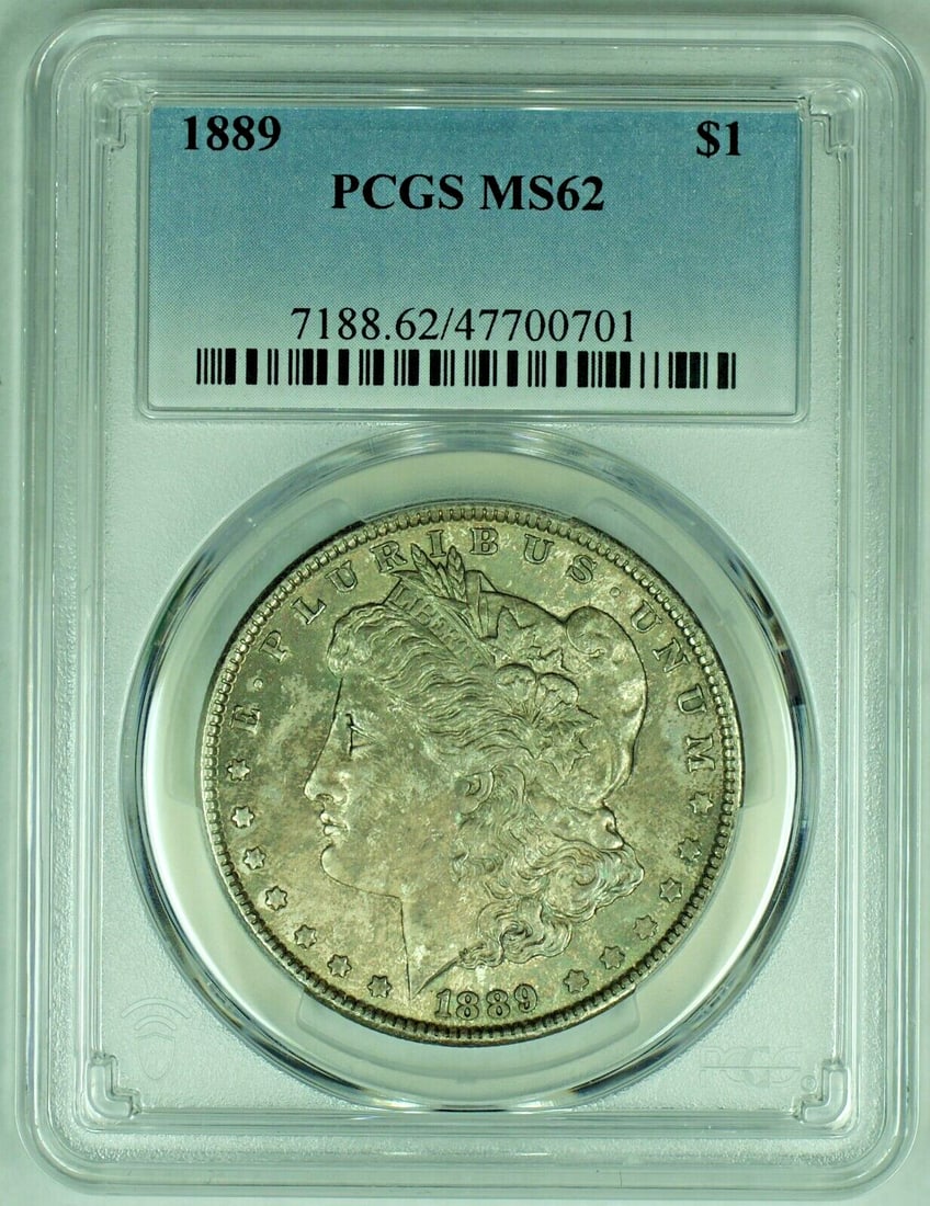 PCGS Graded MS 62+ 1889 Morgan Silver Dollar With Attractive Toning: PCGS Graded MS 62+ 1889 Morgan Silver Dollar With Attractive Toning This 1889 Morgan Silver Dollar is a toned coin graded MS 62+ by PCGS. It is composed of silver and remains uncirculated. The coin or