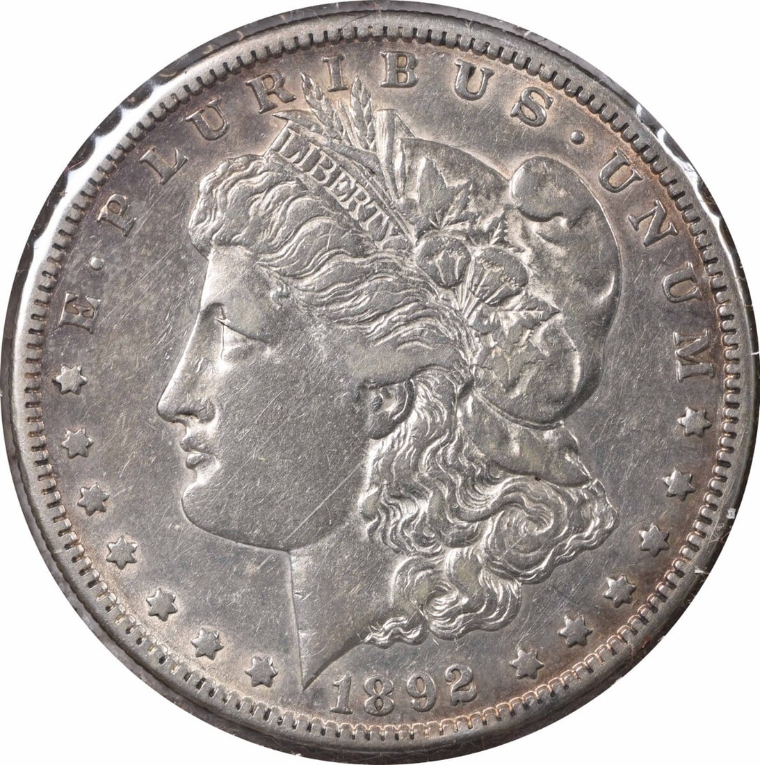 1892-S Morgan Silver Dollar RPD 90% Silver Uncertified Coin: 1892-S Morgan Silver Dollar RPD 90% Silver Uncertified Coin This 1892-S VAM 2 Morgan Silver Dollar is a stunning piece of numismatic history. Struck in 90% silver and 10% copper at the San Francisco M