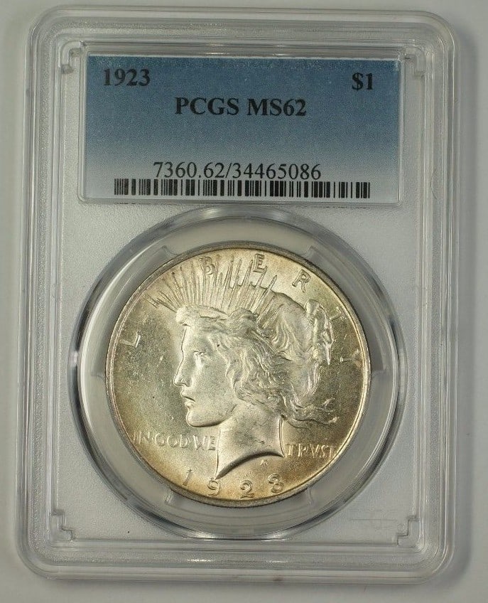 1923 Peace Dollar Silver Coin PCGS MS62 Philadelphia Mint: 1923 Peace Dollar Silver Coin PCGS MS62 Philadelphia Mint This is a 1923 US Peace Silver Dollar $1 coin certified by PCGS with a grade of MS 62. Minted in Philadelphia, this uncirculated coin is compo