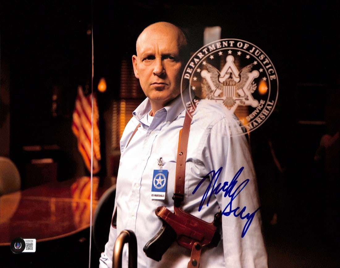Nick Searcy autographed 11x14 photograph from Justified with Beckett authentication: Nick Searcy autographed 11x14 photograph from Justified with Beckett authentication This 11x14 photograph features the signature of actor Nick Searcy, who portrayed Chief Deputy United States Marshal