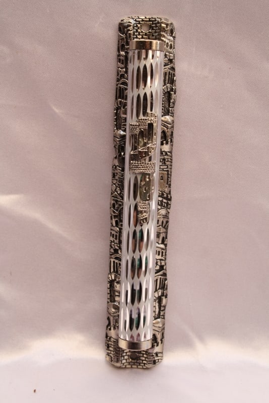 Handmade Silver-Plated Mezuzah by Peninat Hakesef with Box: Handmade Silver-Plated Mezuzah by Peninat Hakesef with Box Discover the beauty of this exquisite hand-made Mezuzah, elegantly silver-plated and crafted in Jerusalem, Israel by Peninat Hakesef. This un
