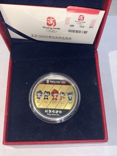 Beijing 2008 Olympic Mascot Gold Plated Commemorative Medal with Case: Beijing 2008 Olympic Mascot Gold Plated Commemorative Medal with Case This 2008 Beijing Commemorative Gold Plated Mascot Medallion is a collectible medal produced for the Beijing 2008 event. The medal