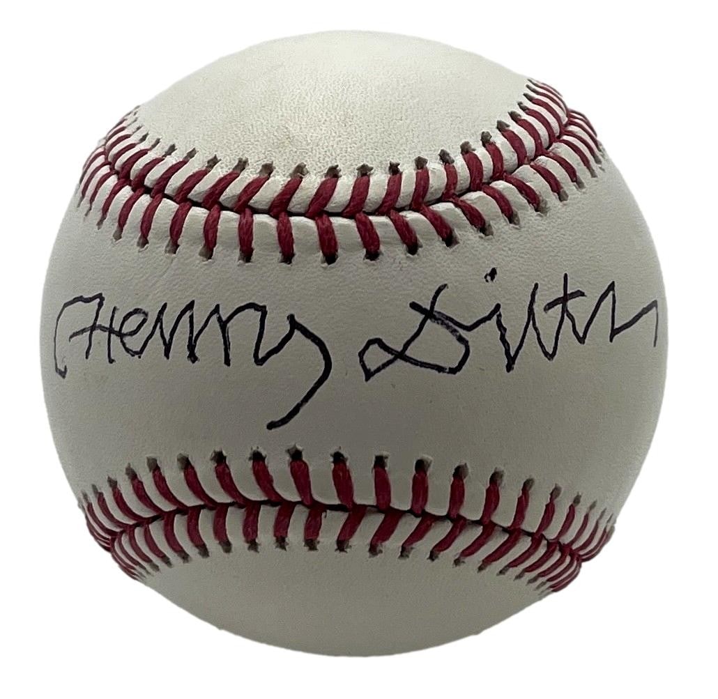 Henry Diltz Signed OML Baseball Woodstock Photographer JSA Authenticated: Henry Diltz Signed OML Baseball Woodstock Photographer JSA Authenticated This is an original Henry Diltz signed OML baseball, featuring the signature of the renowned Woodstock photographer and musicia