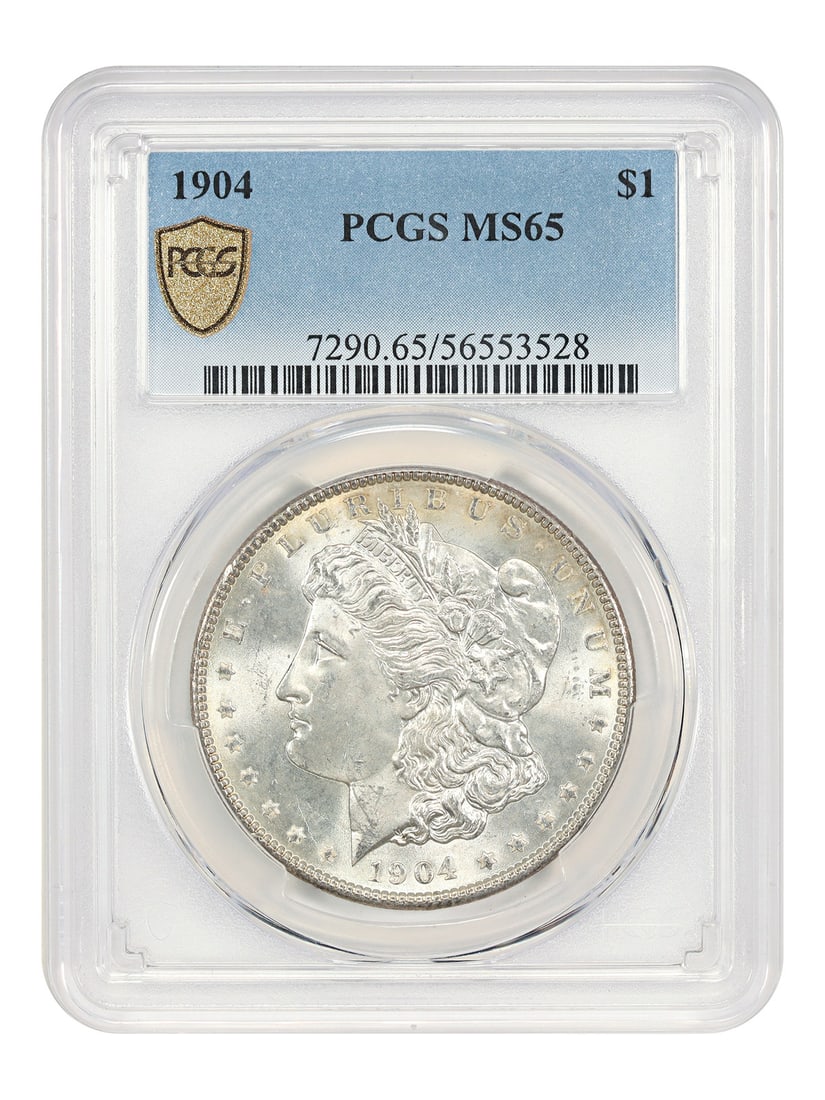 1904 Philadelphia Morgan Silver Dollar PCGS MS65 Gem Uncirculated: 1904 Philadelphia Morgan Silver Dollar PCGS MS65 Gem Uncirculated This 1904 Morgan Dollar is certified by PCGS with a grade of MS65. It is an uncirculated coin from the Philadelphia Mint, featuring sa