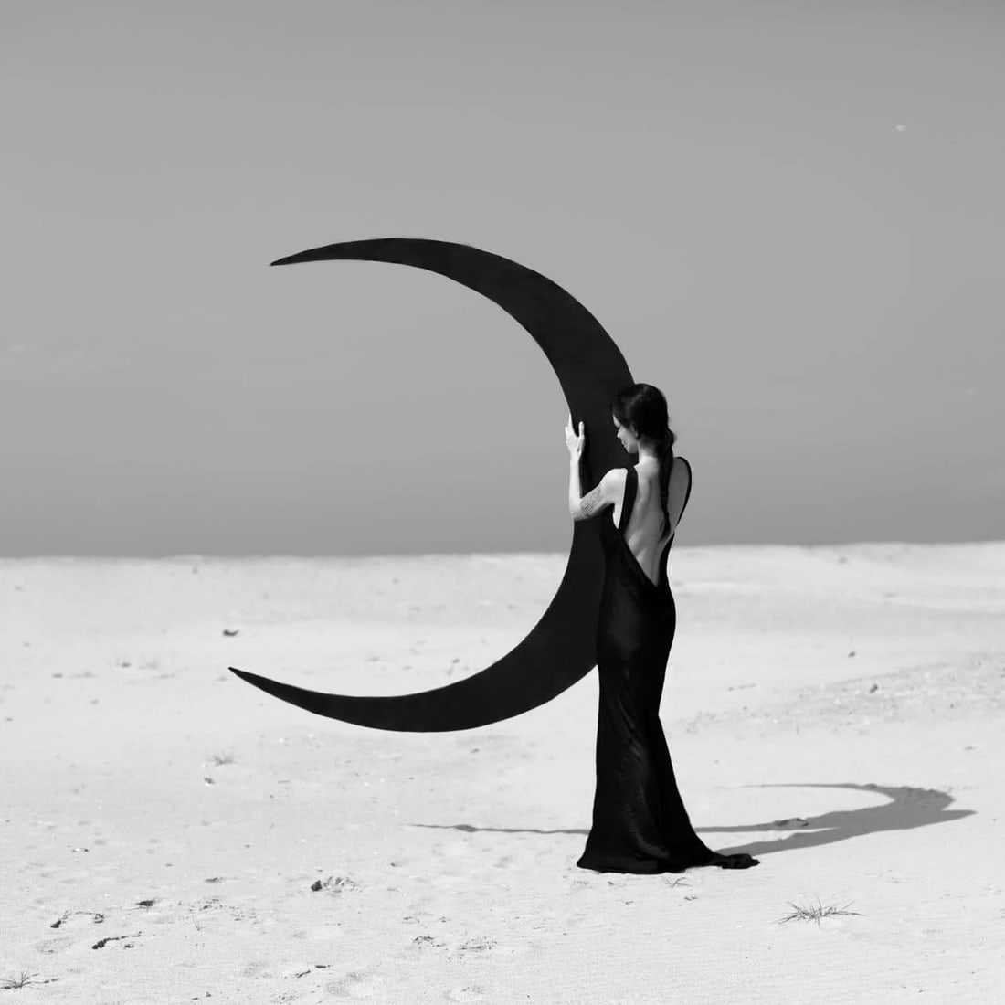 Moon Birth 2 Black and White Photography 24x24 Ed. 1 of 15 by Olha Stepanian: Moon Birth 2 Black and White Photography 24x24 Ed. 1 of 15 by Olha Stepanian "Moon Birth 2" is a striking piece of black and white photography by Olha Stepanian, measuring 24" x 24". Created in 2024,