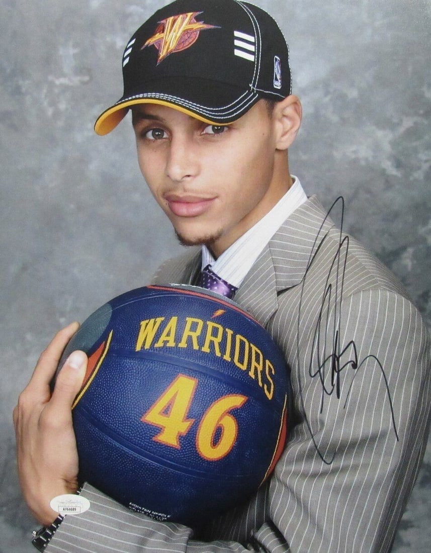 Stephen Curry Signed 11x14 Photo Golden State Warriors JSA Authenticated: Stephen Curry Signed 11x14 Photo Golden State Warriors JSA Authenticated This stunning 11x14 photo features Stephen Curry, a star player of the Golden State Warriors, proudly displaying his signature.
