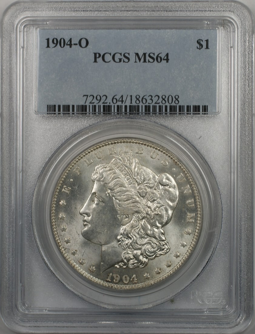 PCGS MS-64 1904-O New Orleans Morgan Silver Dollar $1 Coin: PCGS MS-64 1904-O New Orleans Morgan Silver Dollar $1 Coin This is a 1904-O Morgan Silver Dollar $1 coin graded MS-64 by PCGS. Minted in New Orleans, this uncirculated coin is composed of silver with