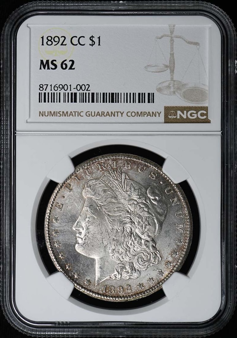 NGC MS62 Carson City 1892 Morgan Silver Dollar: NGC MS62 Carson City 1892 Morgan Silver Dollar This 1892-CC Morgan Dollar is certified by NGC with a grade of MS62. Struck in Carson City, this uncirculated coin is a pre-owned example of the classic