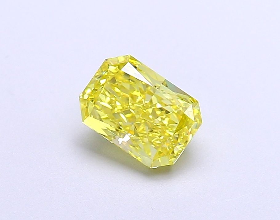 Loose Diamond - RADIANT 1.03ct Fancy Vivid Yellow VVS2: Loose Diamond - RADIANT 1.03ct Fancy Vivid Yellow VVS2 Source: This is a real non-mined Diamond that has been grown in a lab Shape: RADIANT Carats: 1.03 Color: Fancy Vivid Yellow Certification: IGI