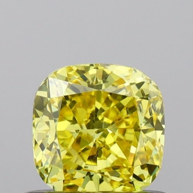 Loose Diamond - CUSHION BRILLIANT 0.63ct Fancy Vivid Yellow SI2: Loose Diamond - CUSHION BRILLIANT 0.63ct Fancy Vivid Yellow SI2 Source: This is a real non-mined Diamond that has been grown in a lab Shape: CUSHION BRILLIANT Carats: 0.63 Color: Fancy Vivid Yellow Ce