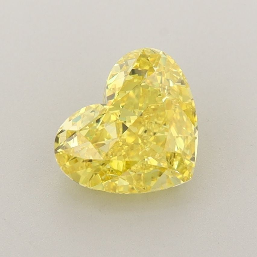 Loose Diamond - HEART 1.4ct Fancy Vivid Yellow VS2: Loose Diamond - HEART 1.4ct Fancy Vivid Yellow VS2 Source: This is a real non-mined Diamond that has been grown in a lab Shape: HEART Carats: 1.4 Color: Fancy Vivid Yellow Certification: IGI Video: