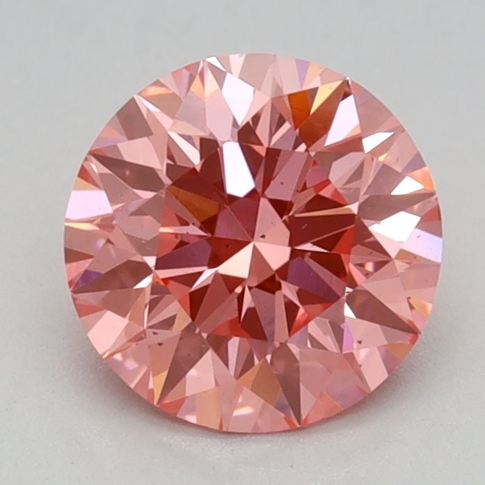 Loose Diamond - ROUND 1.01ct Fancy Vivid Pink SI1: Loose Diamond - ROUND 1.01ct Fancy Vivid Pink SI1 Source: This is a real non-mined Diamond that has been grown in a lab Shape: ROUND Carats: 1.01 Color: Fancy Vivid Pink Certification: IGI Video: