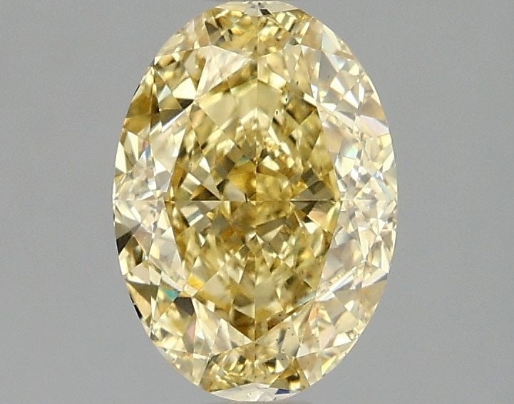 Loose Diamond - OVAL 1.58ct Fancy Vivid Yellow VS2: Loose Diamond - OVAL 1.58ct Fancy Vivid Yellow VS2 Source: This is a real non-mined Diamond that has been grown in a lab Shape: OVAL Carats: 1.58 Color: Fancy Vivid Yellow Certification: IGI Video:
