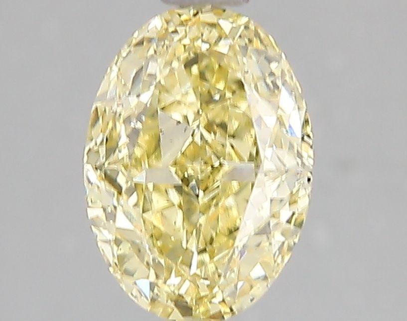 Loose Diamond - OVAL 2.08ct Fancy Intense Yellow SI1: Loose Diamond - OVAL 2.08ct Fancy Intense Yellow SI1 Source: This is a real non-mined Diamond that has been grown in a lab Shape: OVAL Carats: 2.08 Color: Fancy Intense Yellow Certification: IGI Video