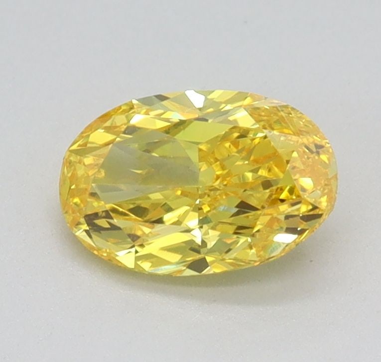 Loose Diamond - OVAL 0.65ct Fancy Vivid Yellow VS1: Loose Diamond - OVAL 0.65ct Fancy Vivid Yellow VS1 Source: This is a real non-mined Diamond that has been grown in a lab Shape: OVAL Carats: 0.65 Color: Fancy Vivid Yellow Certification: IGI Video: