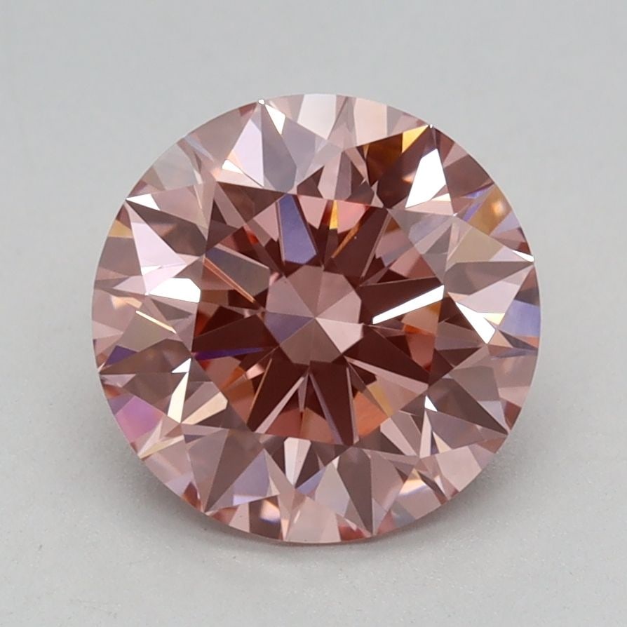 Ideal Loose Diamond - ROUND 1.65ct Fancy Vivid Pink VS1: Ideal Loose Diamond - ROUND 1.65ct Fancy Vivid Pink VS1 Source: This is a real non-mined Diamond that has been grown in a lab Shape: ROUND Carats: 1.65 Color: Fancy Vivid Pink Certification: IGI Video