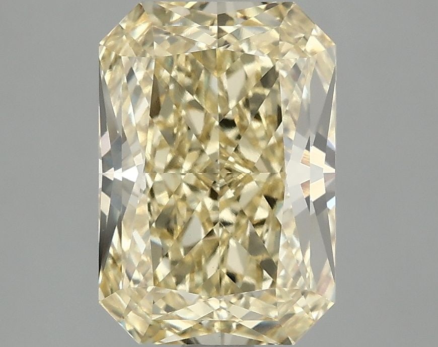 Loose Diamond - RADIANT 3.1ct Fancy Vivid Yellow VVS2: Loose Diamond - RADIANT 3.1ct Fancy Vivid Yellow VVS2 Source: This is a real non-mined Diamond that has been grown in a lab Shape: RADIANT Carats: 3.1 Color: Fancy Vivid Yellow Certification: IGI Vide