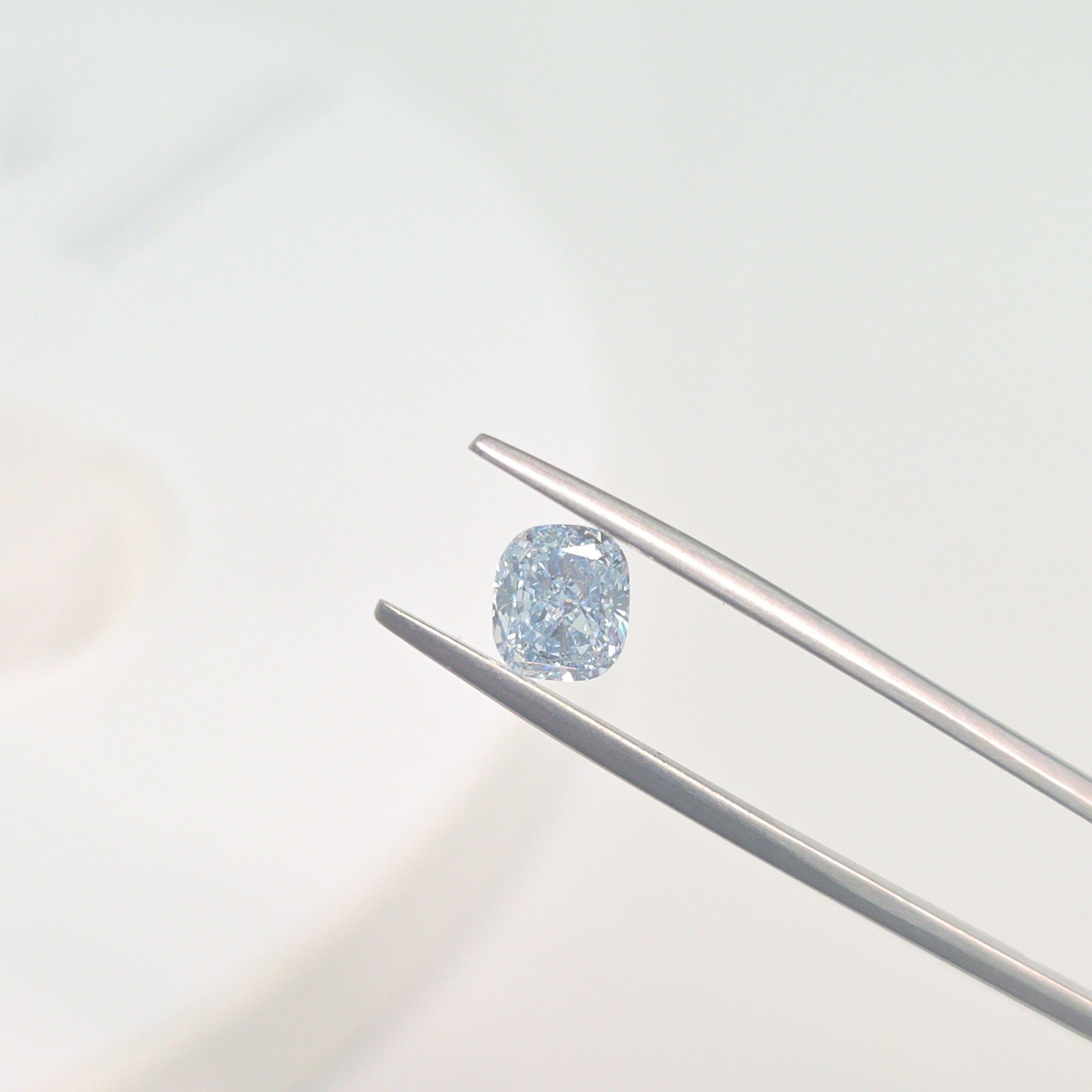 Loose Diamond - CUSHION MODIFIED 1.05ct Fancy Blue VVS2: Loose Diamond - CUSHION MODIFIED 1.05ct Fancy Blue VVS2 Source: This is a real non-mined Diamond that has been grown in a lab Shape: CUSHION MODIFIED Carats: 1.05 Color: Fancy Blue Certification: IGI